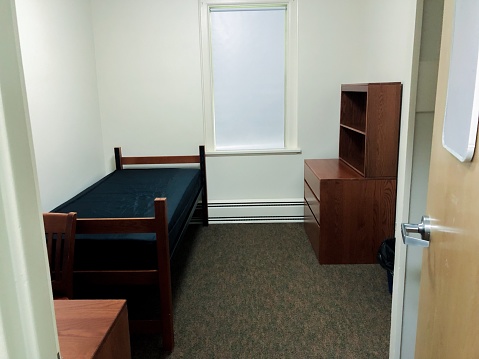 Standard college/university/boarding student dormitory room.